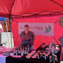 Colorful gluten free items displayed in booth