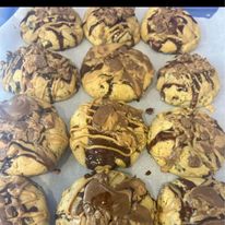 Tray of yellow cookies with chocolate