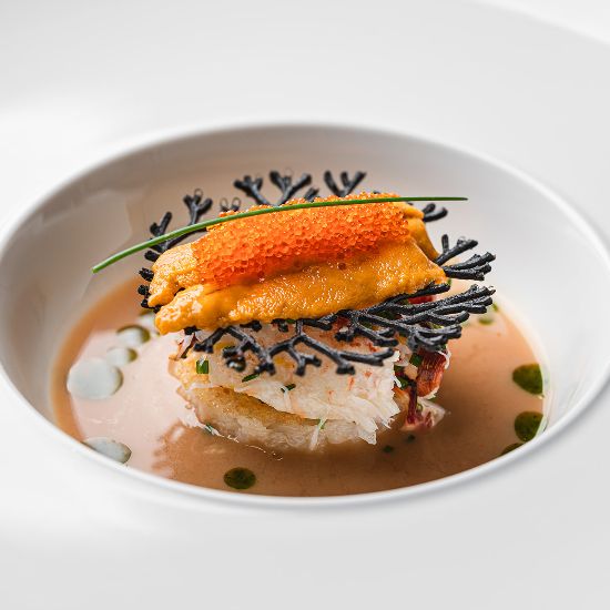 close up of fine dining dish in white bowl