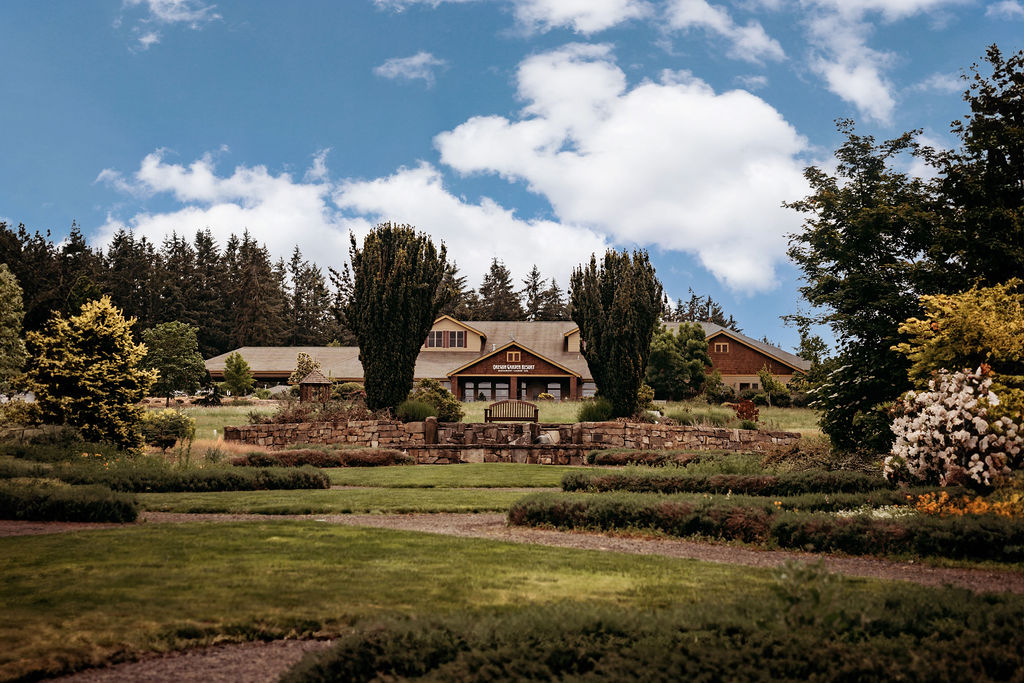 exterior shot of Oregon Garden Resort with beautiful trees and landscaping