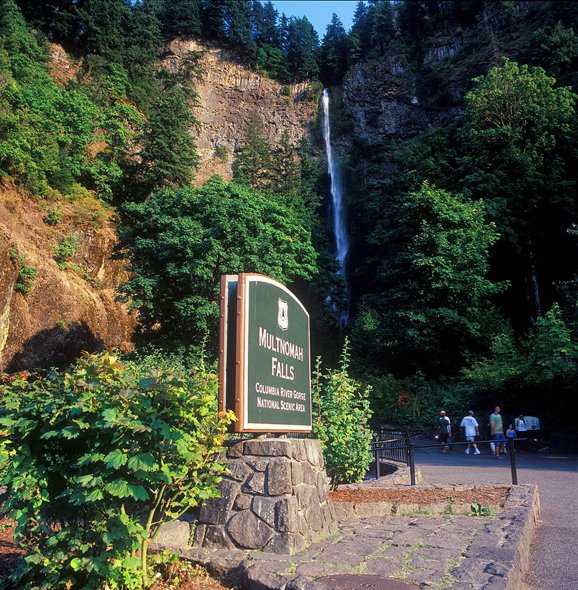 Multnomah Falls with historic falls signage in foreground