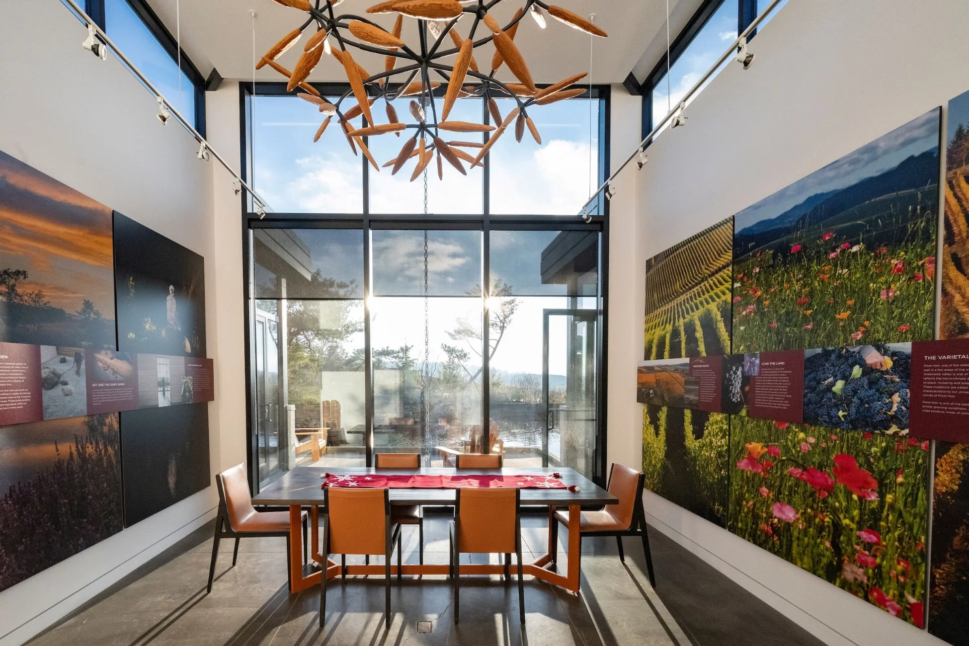 interior of tasting room with contemporary art hanging on walls