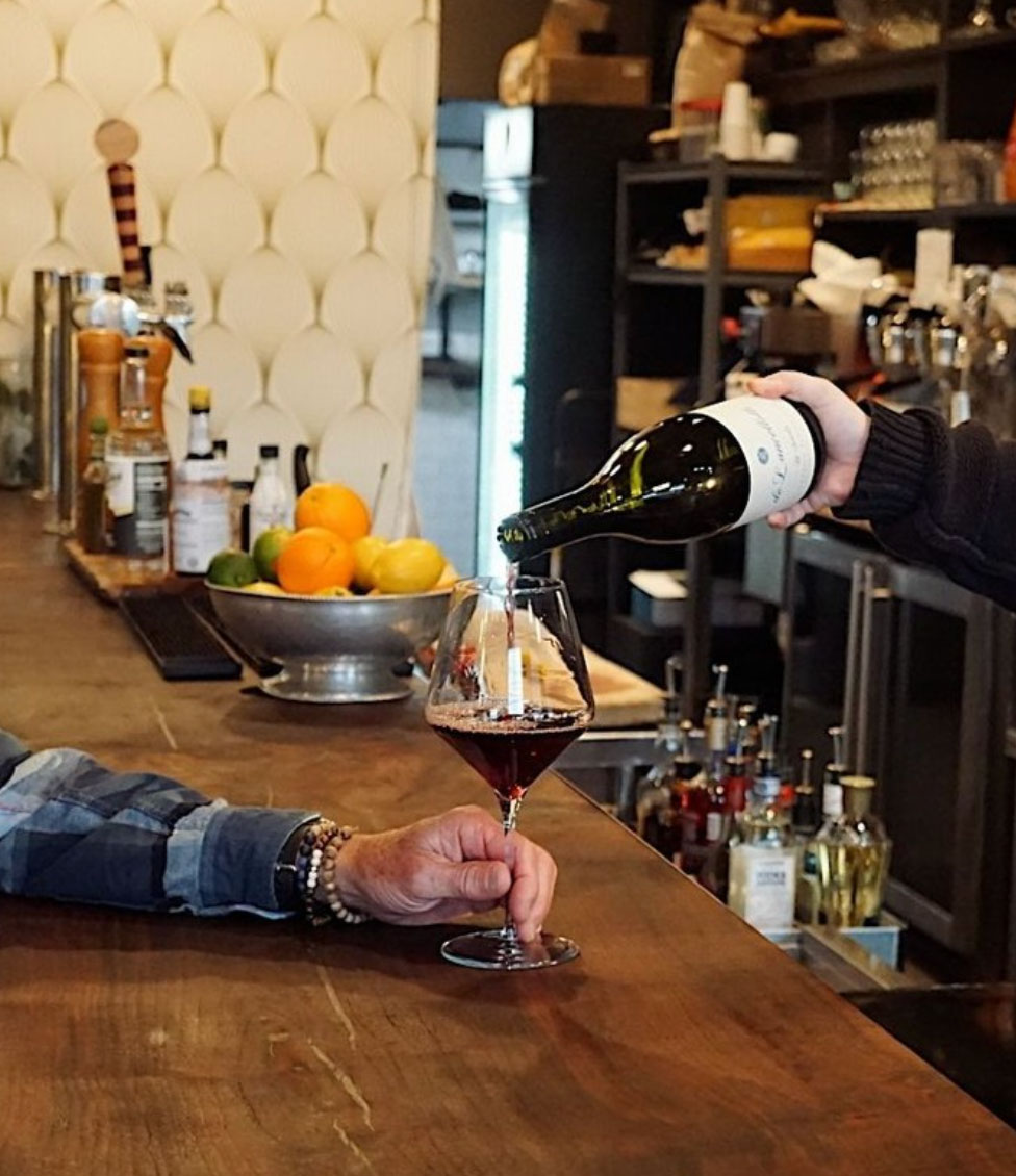 Wine being poured into glass
