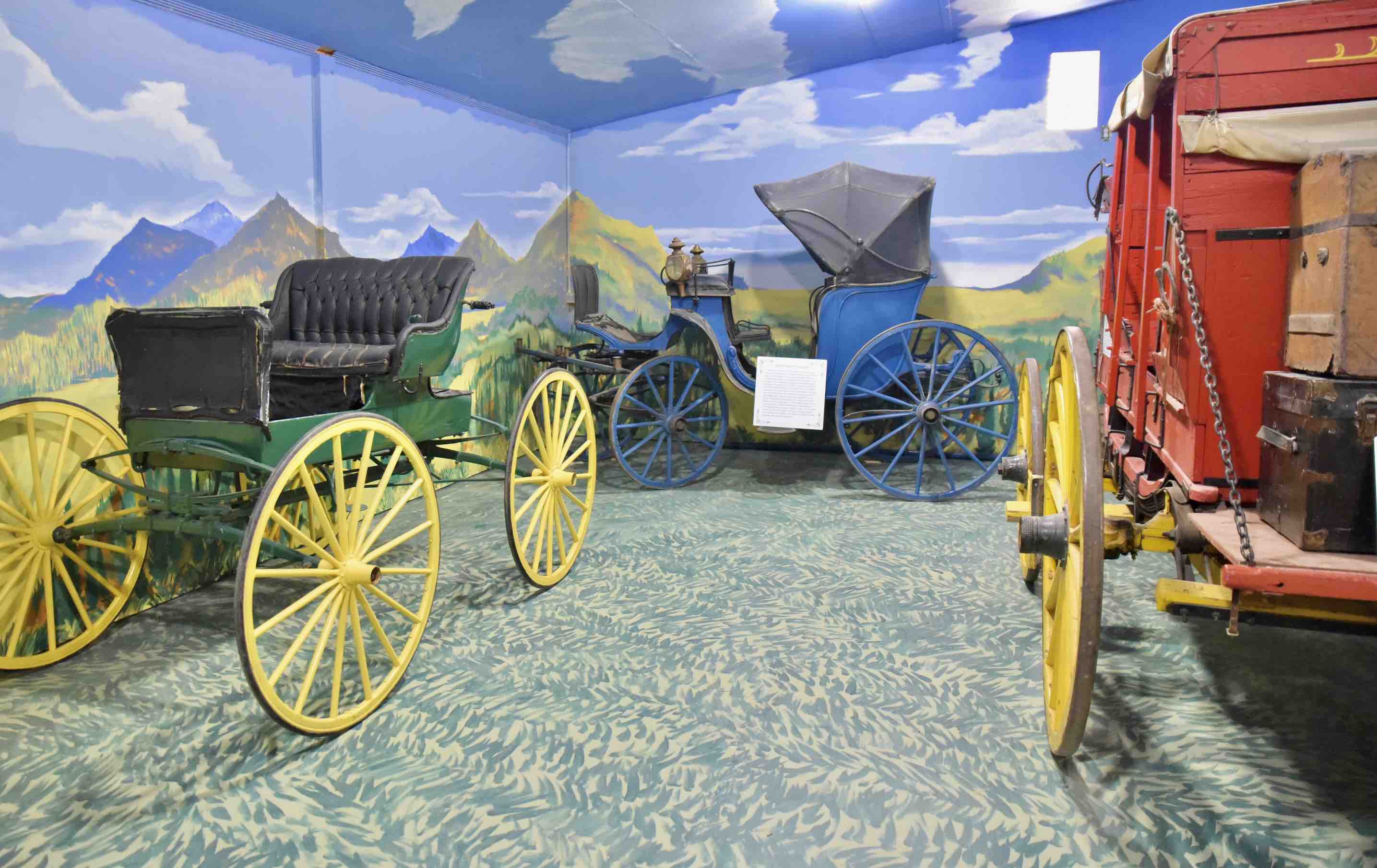 museum display of three wagons