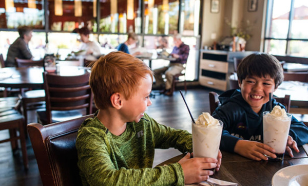 kids enjoying milkshakes