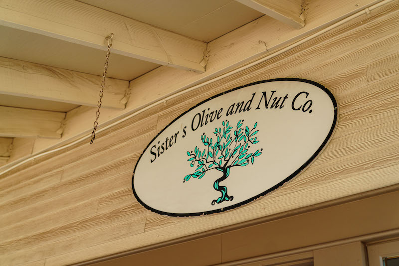 sisters olive and nut co sign