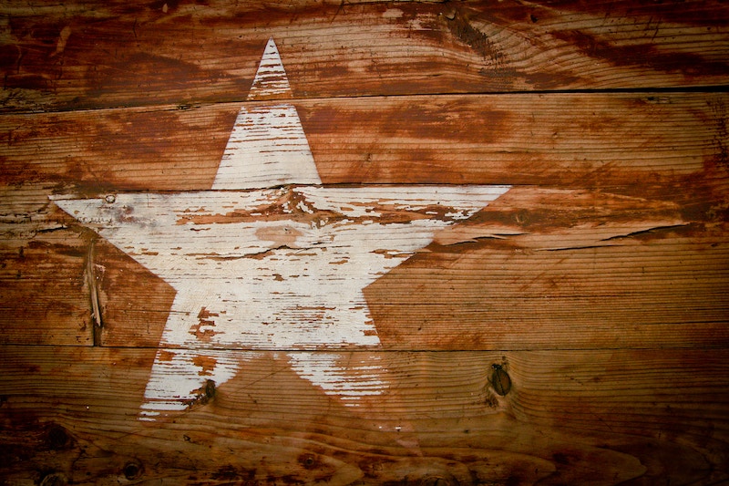 white star painted on wood