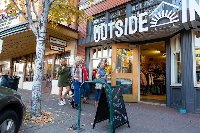 friends walking into Outside In