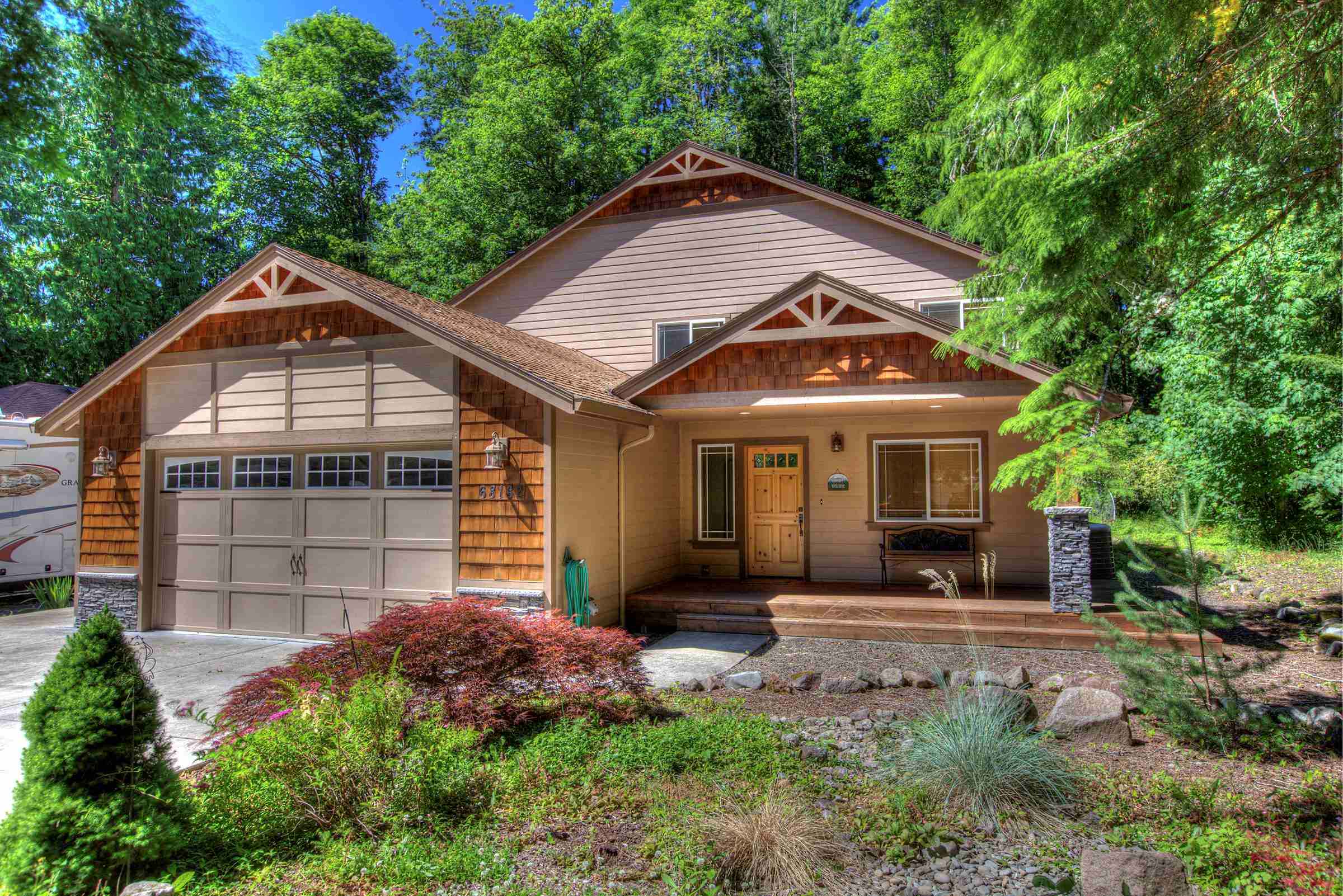 Exterior view of Twinberry Loop House and it's front gardens.
