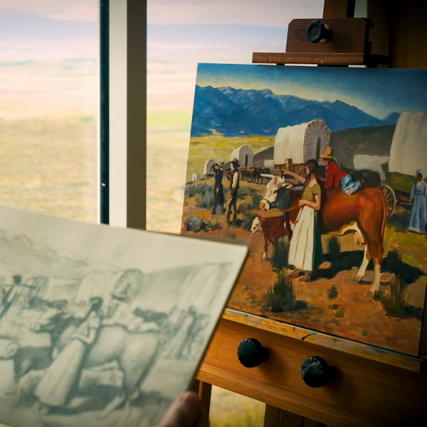 A painting of a covered wagon train on the oregon trail. In the foreground, a sketch of the same painting.