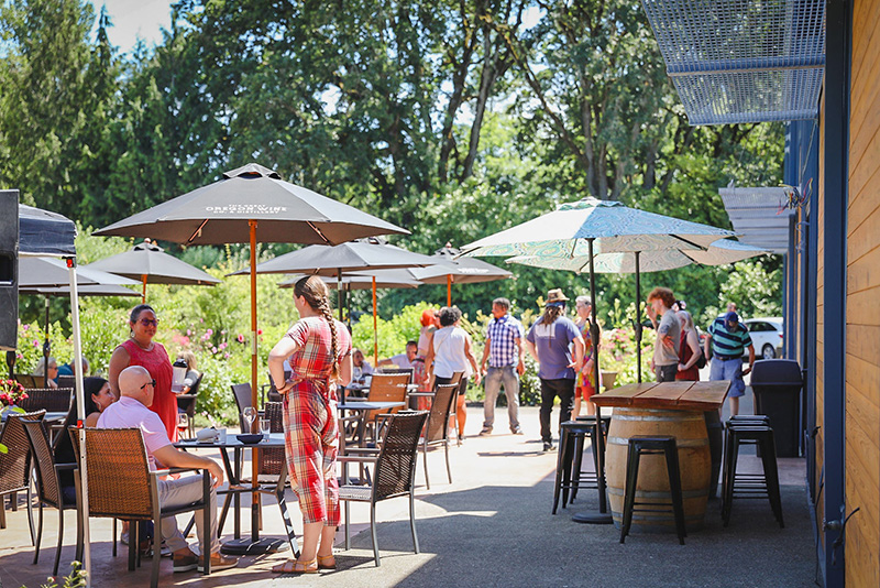 People enjoying a glass of wine at Rex Hill