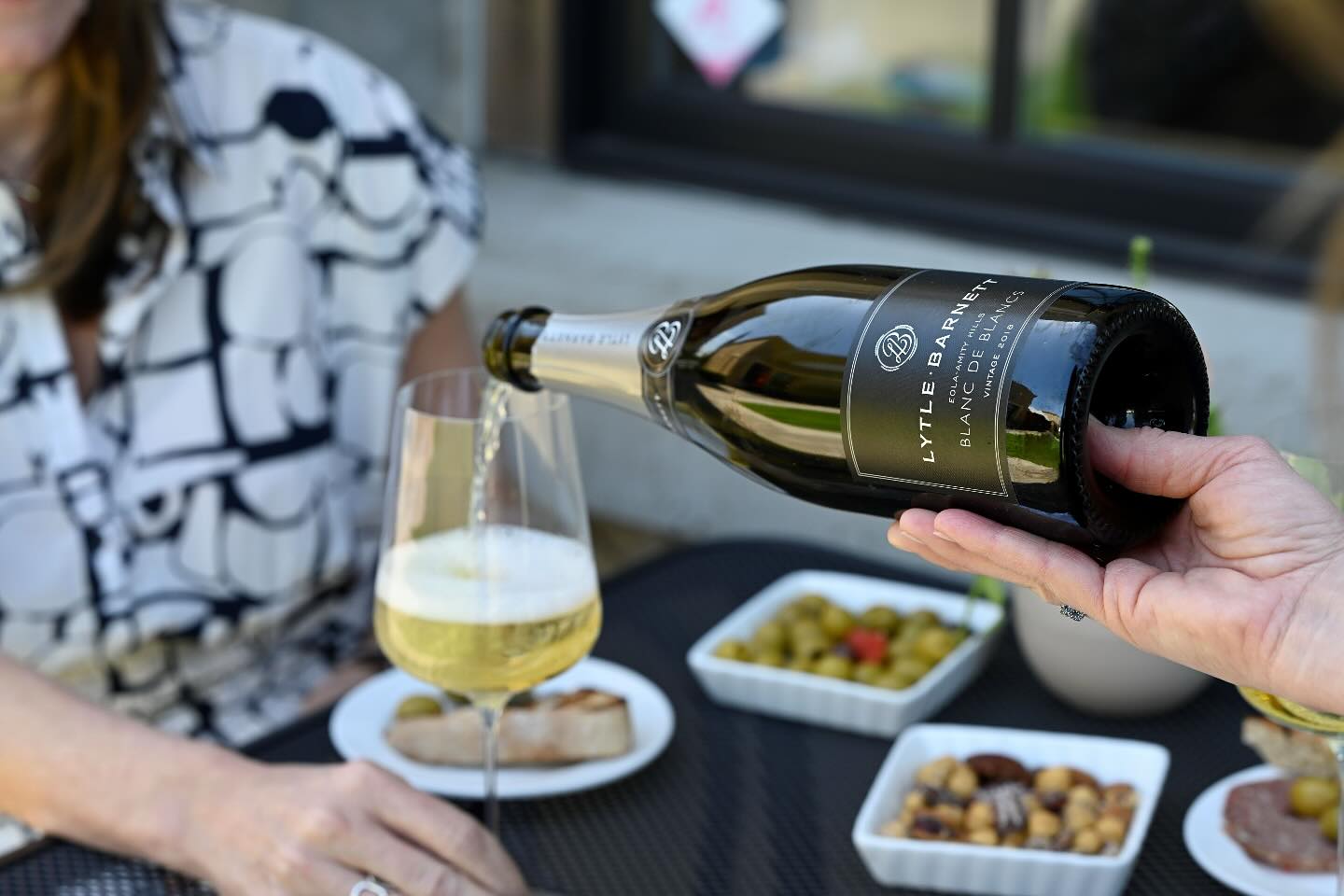Pouring wine into glass