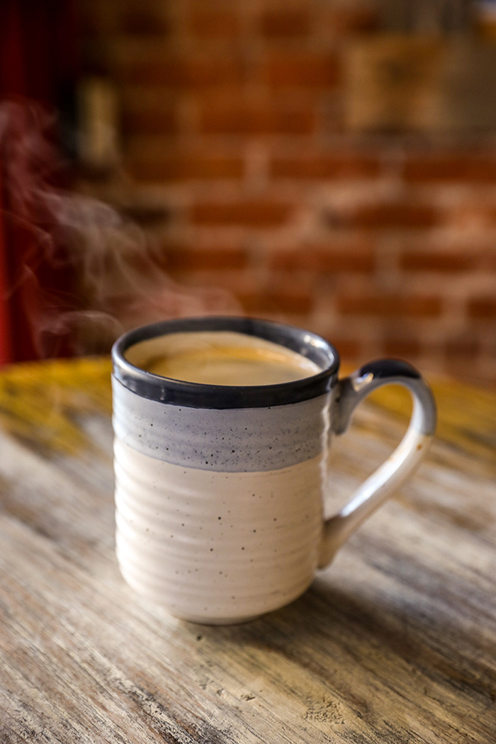 Cup of steaming coffee