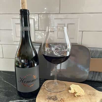 Custom wine label and glass of wine