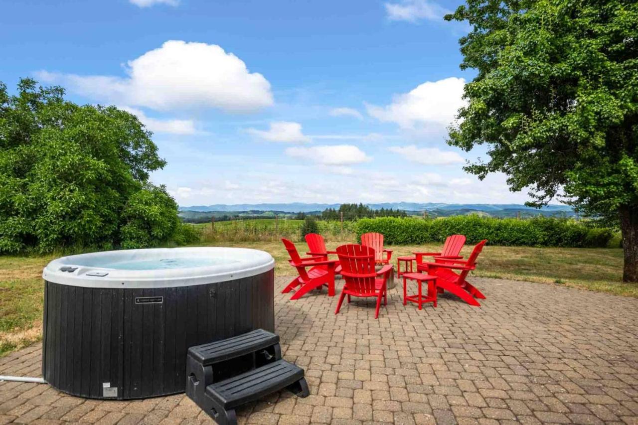 Backyard with lawn chairs and hot tub