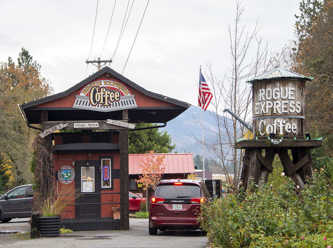 A drive-thru coffee shop with a train theme