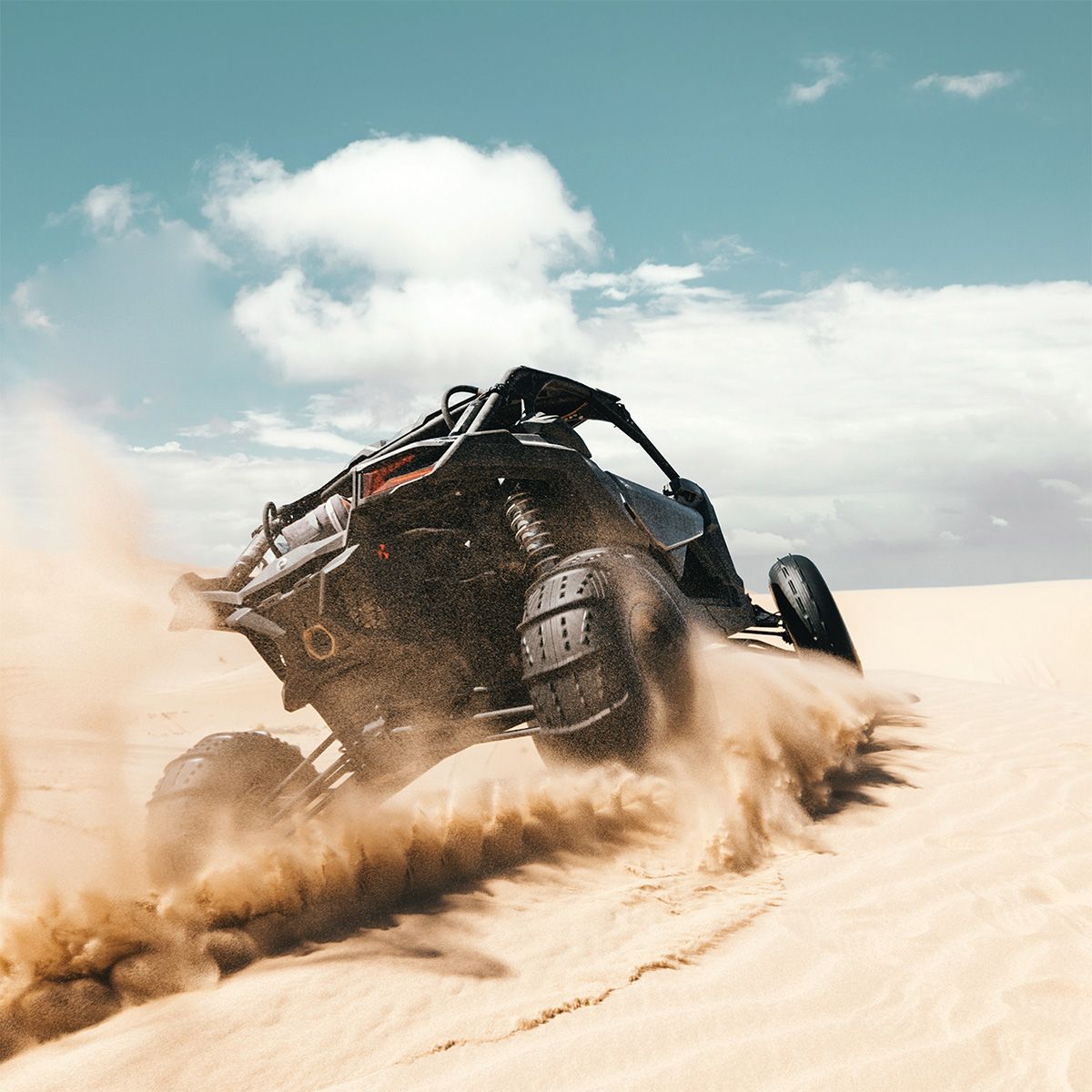 UTV vehicle on a sand dune