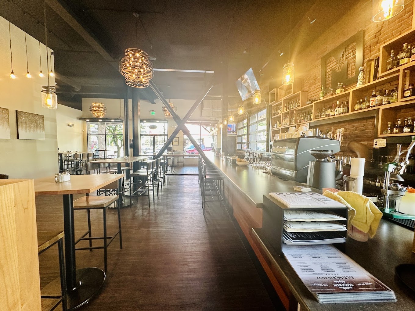 bar area of restaurant with modular wooden shelving