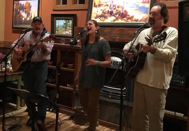 Band members playing together