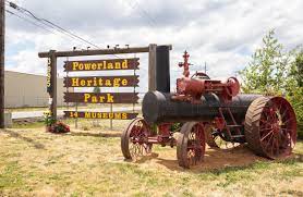 red tracker in front of powerland heritage park sign