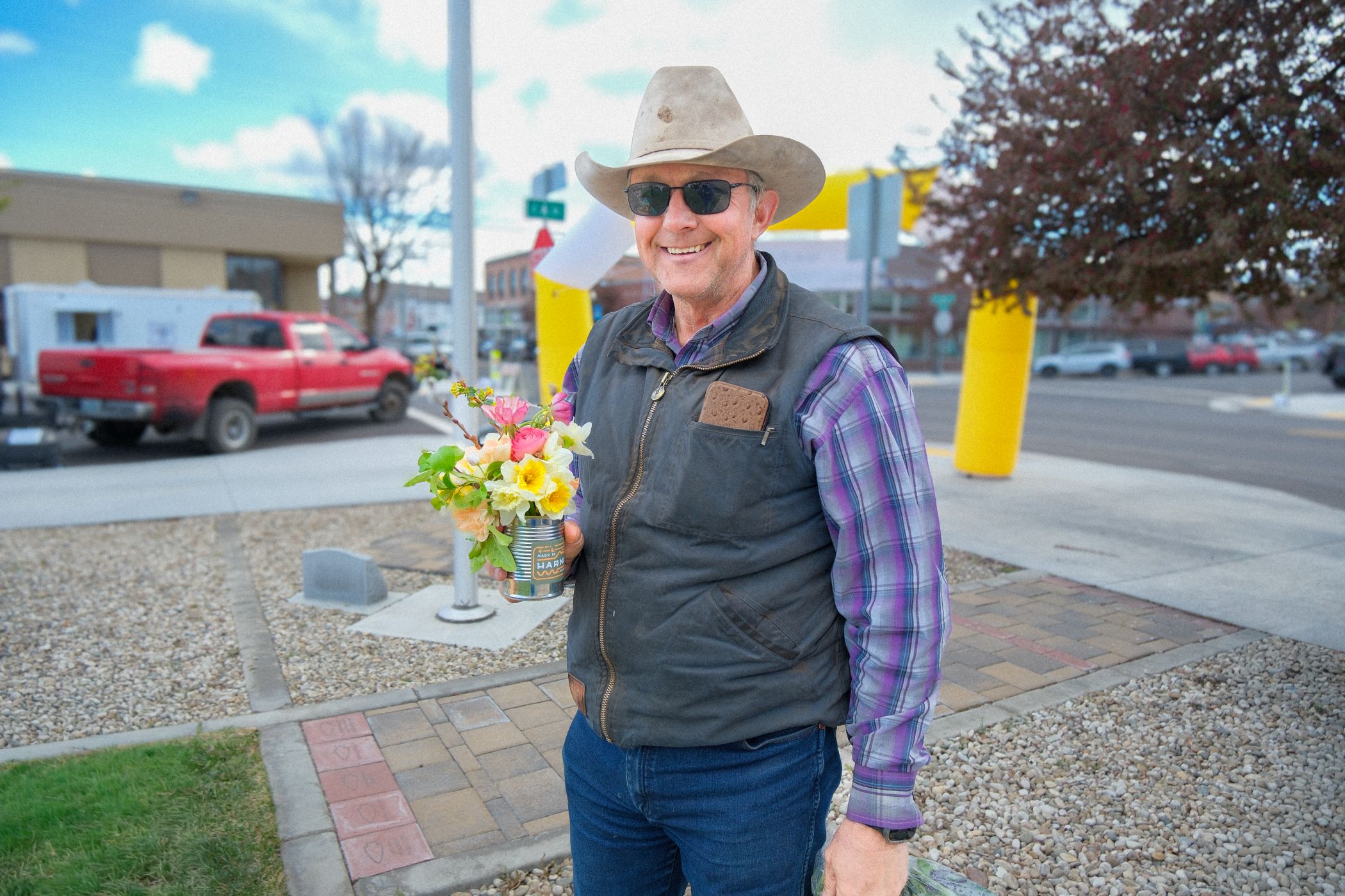 man with wildflower bouquet
