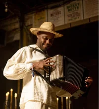 Cedric Watson playing accordion