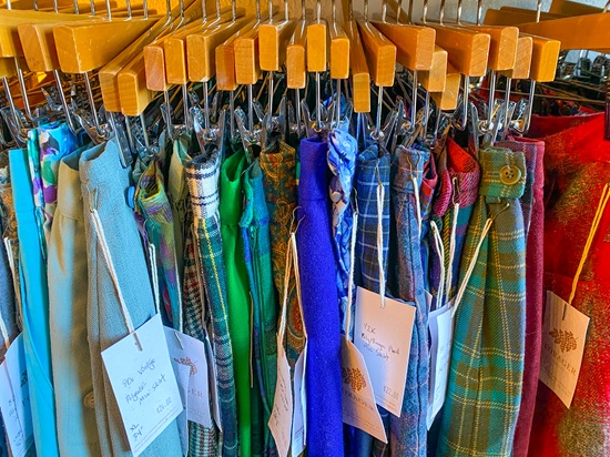 Rack of pants in various styles and materials