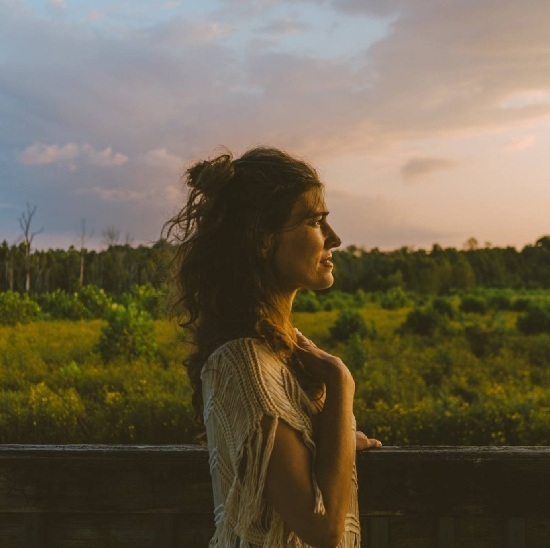 Ruth Moody with a field in the background