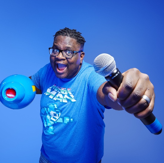 Mega Ran with a microphone