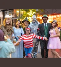Six figures dressed up as the Wizard of Oz characters (plus one person dressed as Waldo from Where's Waldo)