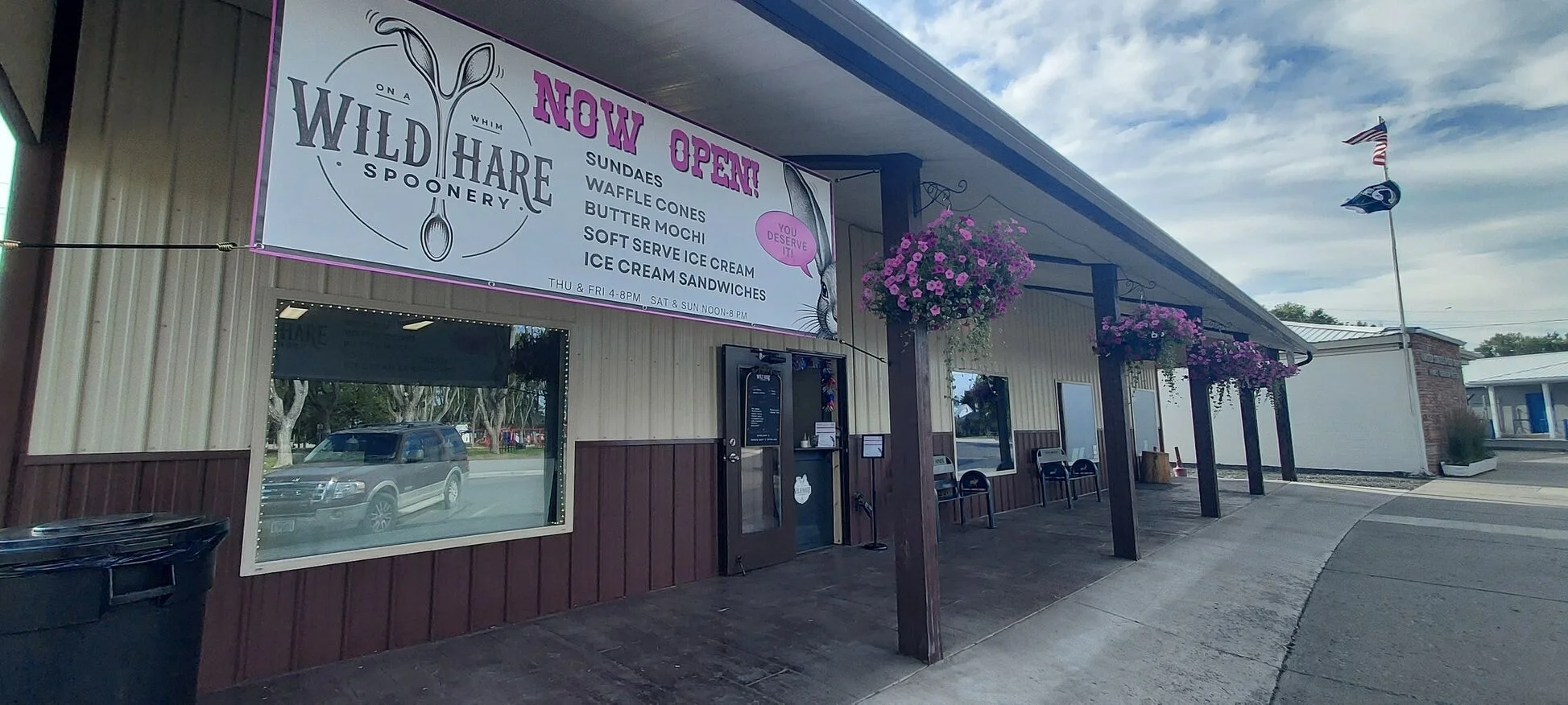 Storefront with banner for Wild Hare Spoonery.