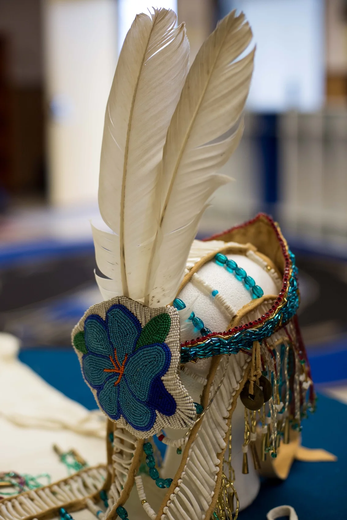 A traditional Dentalium headress piece made by artist Mildred Quaempts from the Confederated Tribes of the Umatilla Indian Reservation.